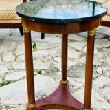 Empire side table in mahogany and mahogany veneer.