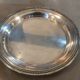 Pair of Christofle silver metal bottle undersides