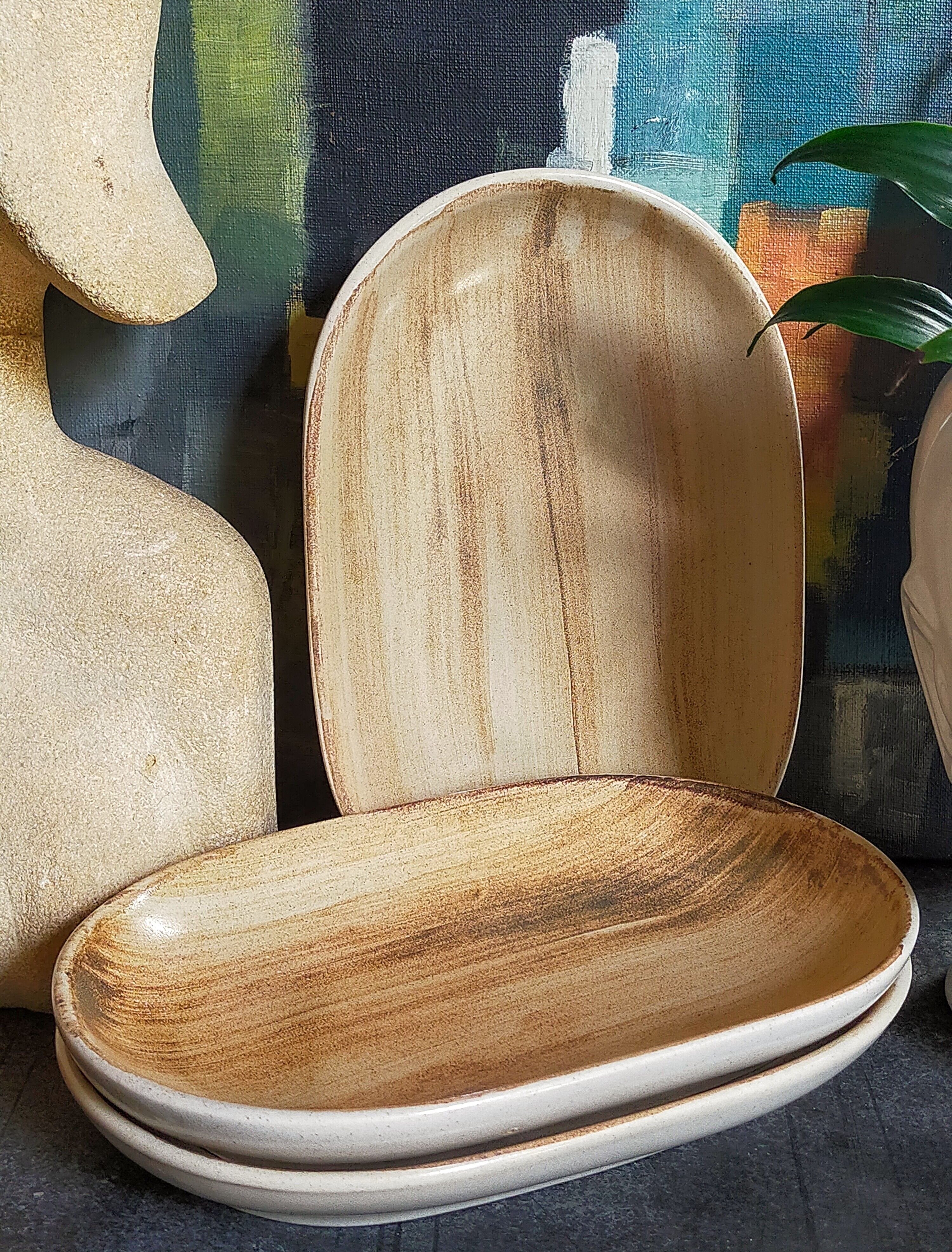 Three ceramic raviers decorated with vintage brushstrokes