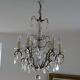 Bronze and crystal chandelier with six arms of light