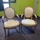 Pair of Louis XVI style armchairs, in solid walnut, re-edged and upholstered, pegged