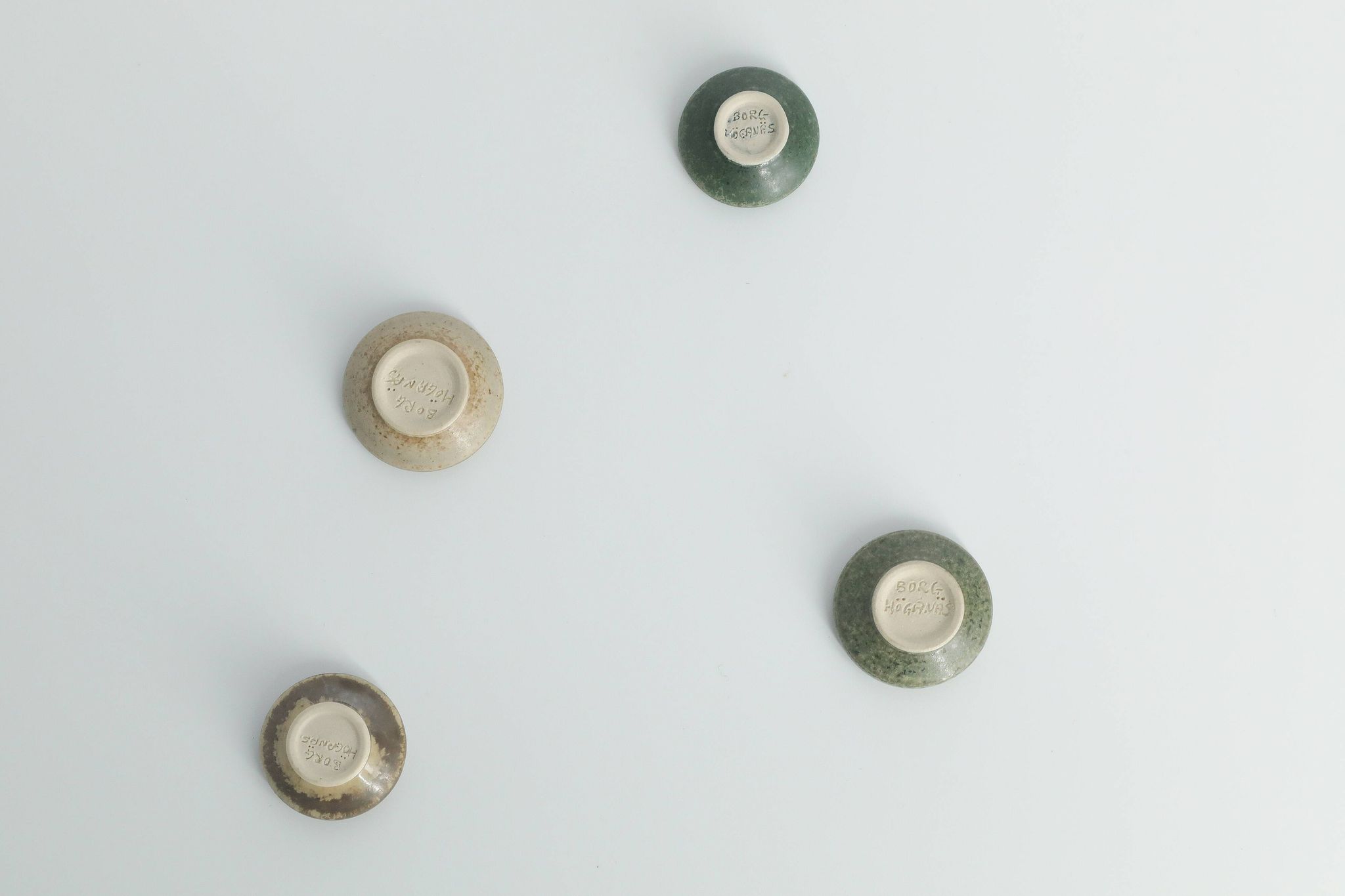 Set of 4 Scandinavian collection bowls in brown and green stoneware, mid-20th century.