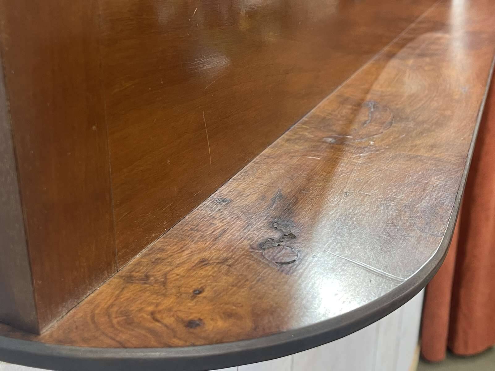 English mahogany shelf with its bevelled mirror from the early 20th century.