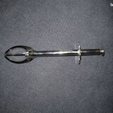 Old sugar tongs with original box.