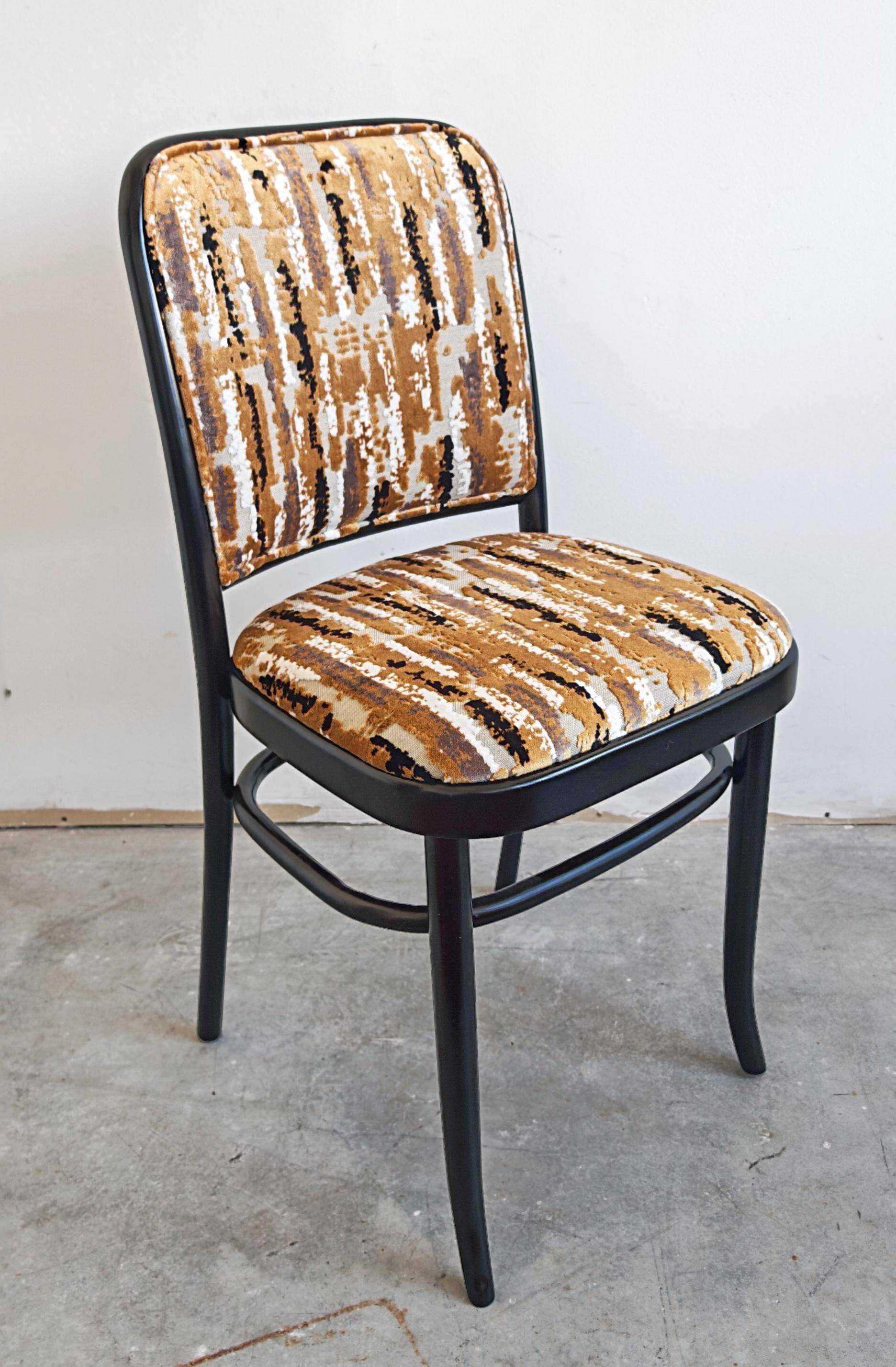 Set of 4 curved wood dining chairs by Josef Hoffmann for Mundus.