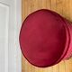 Pouf en velours rouge