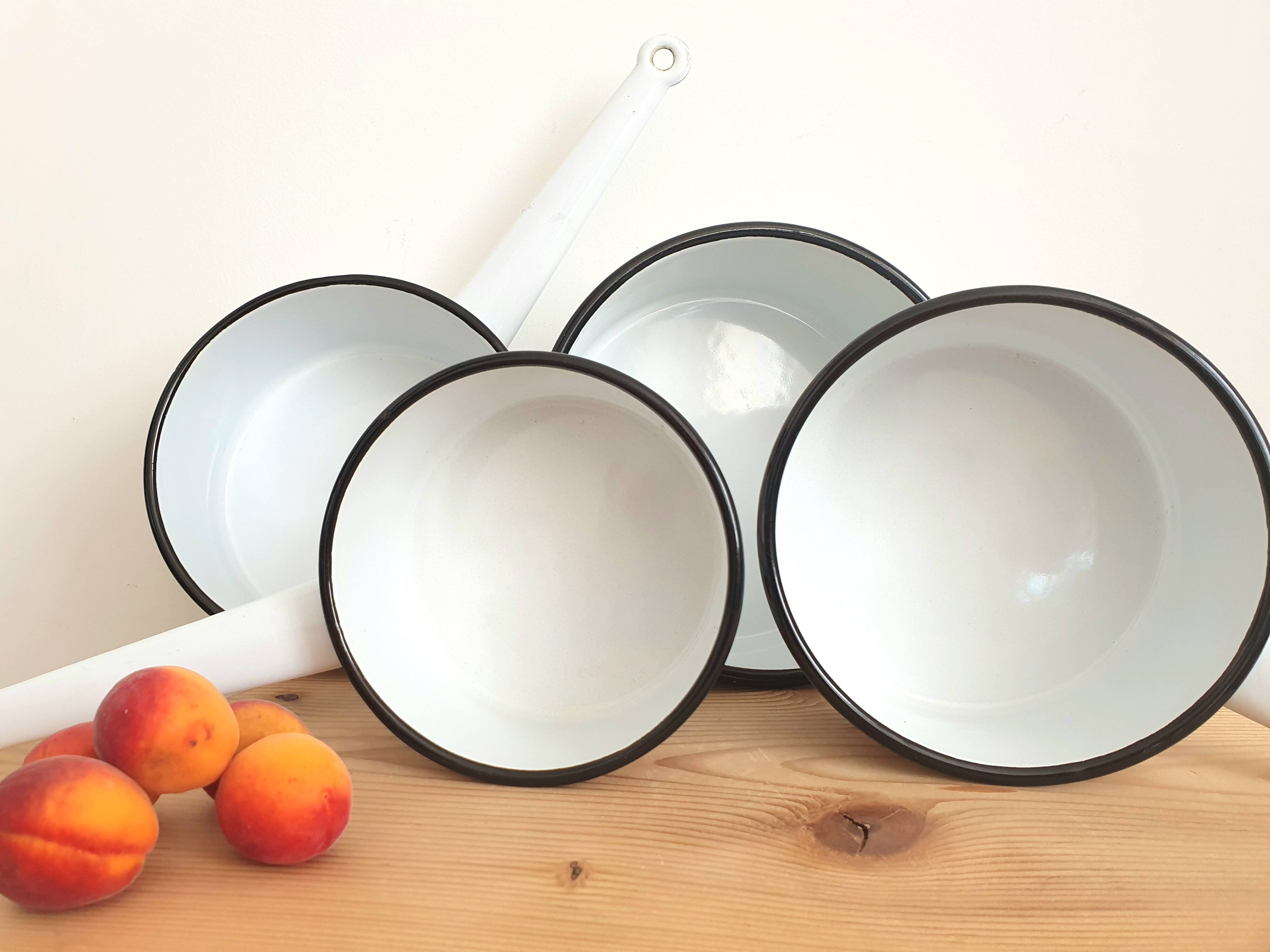 Series of 4 vintage enamelled casserolles