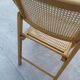 Folding chair in cannage