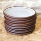 11 enameled stoneware dessert plates by Jeanne et Norbert Pierlot Ratilly