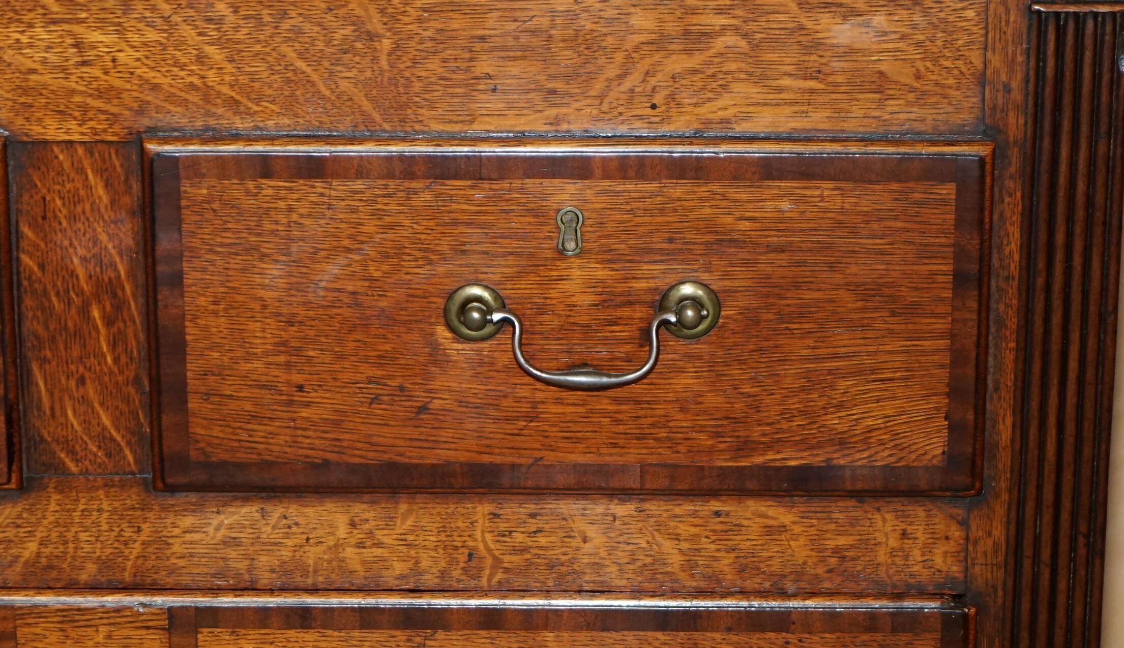 Georgian oak commode with a folding top, English, 18th century.