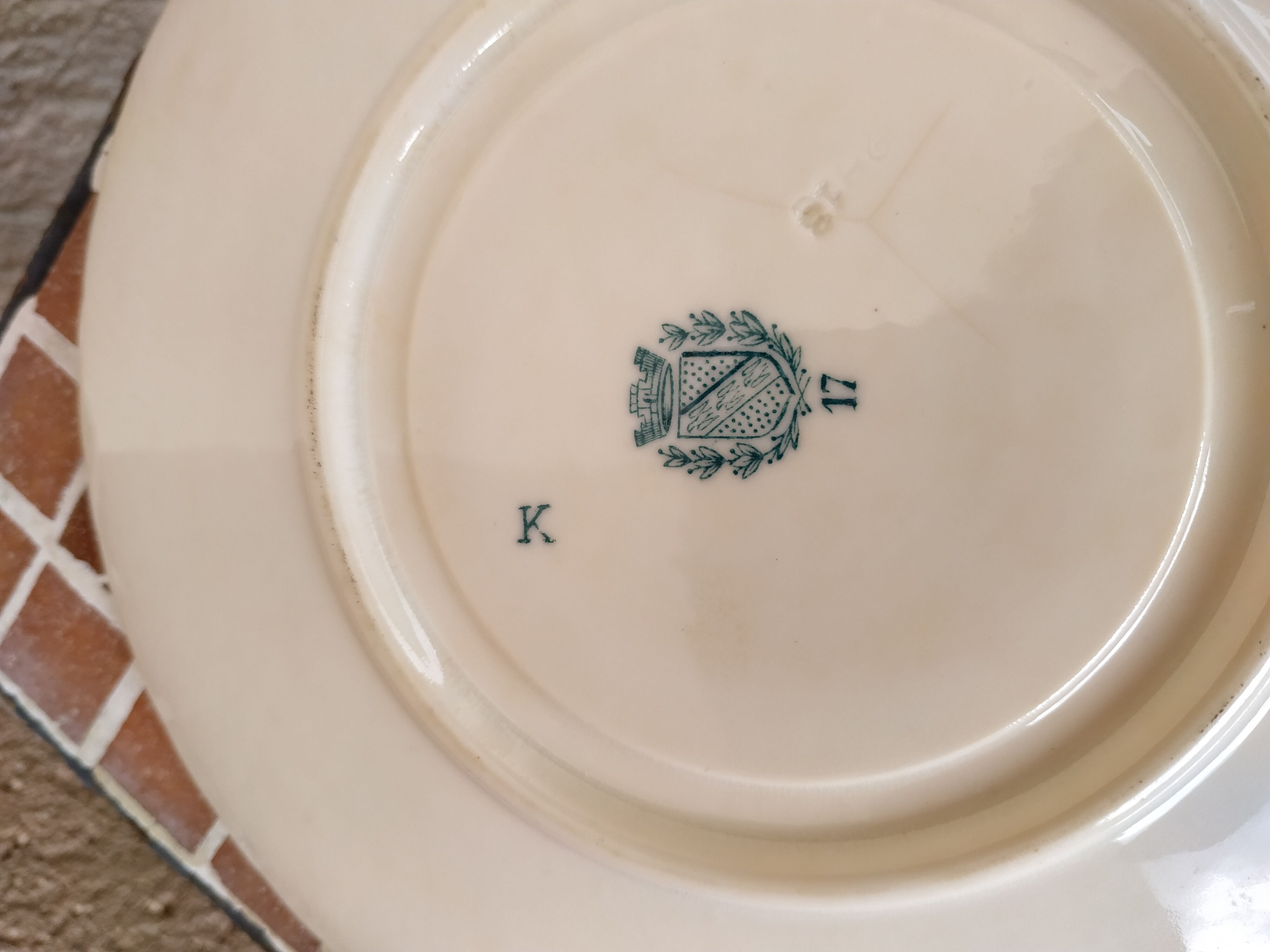 Ancient porcelain cup from eastern France with Mauve Fleurettes