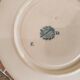 Ancient porcelain cup from eastern France with Mauve Fleurettes