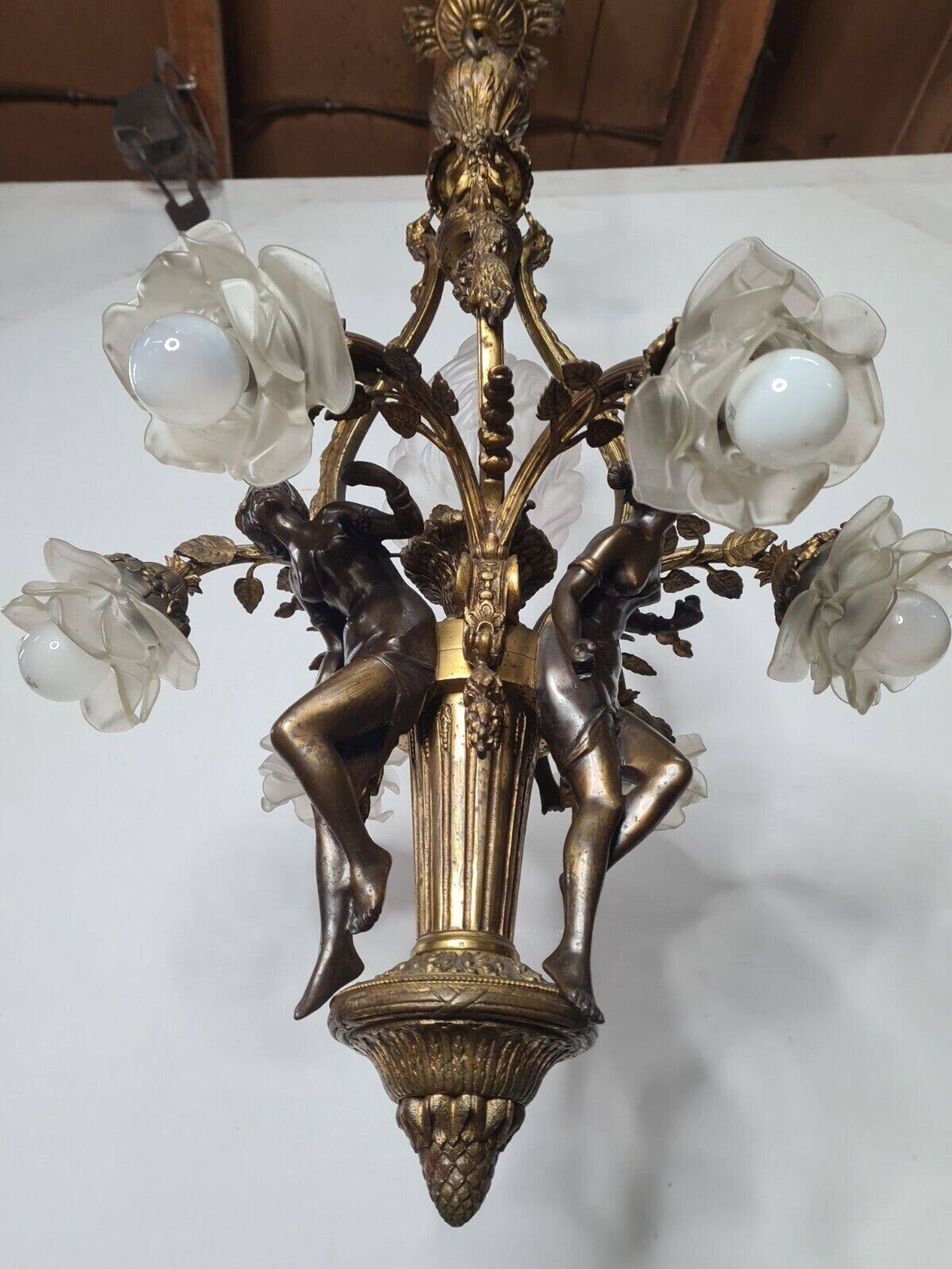 LOUIS XV style chandelier in gilded and patinated bronze with draped women