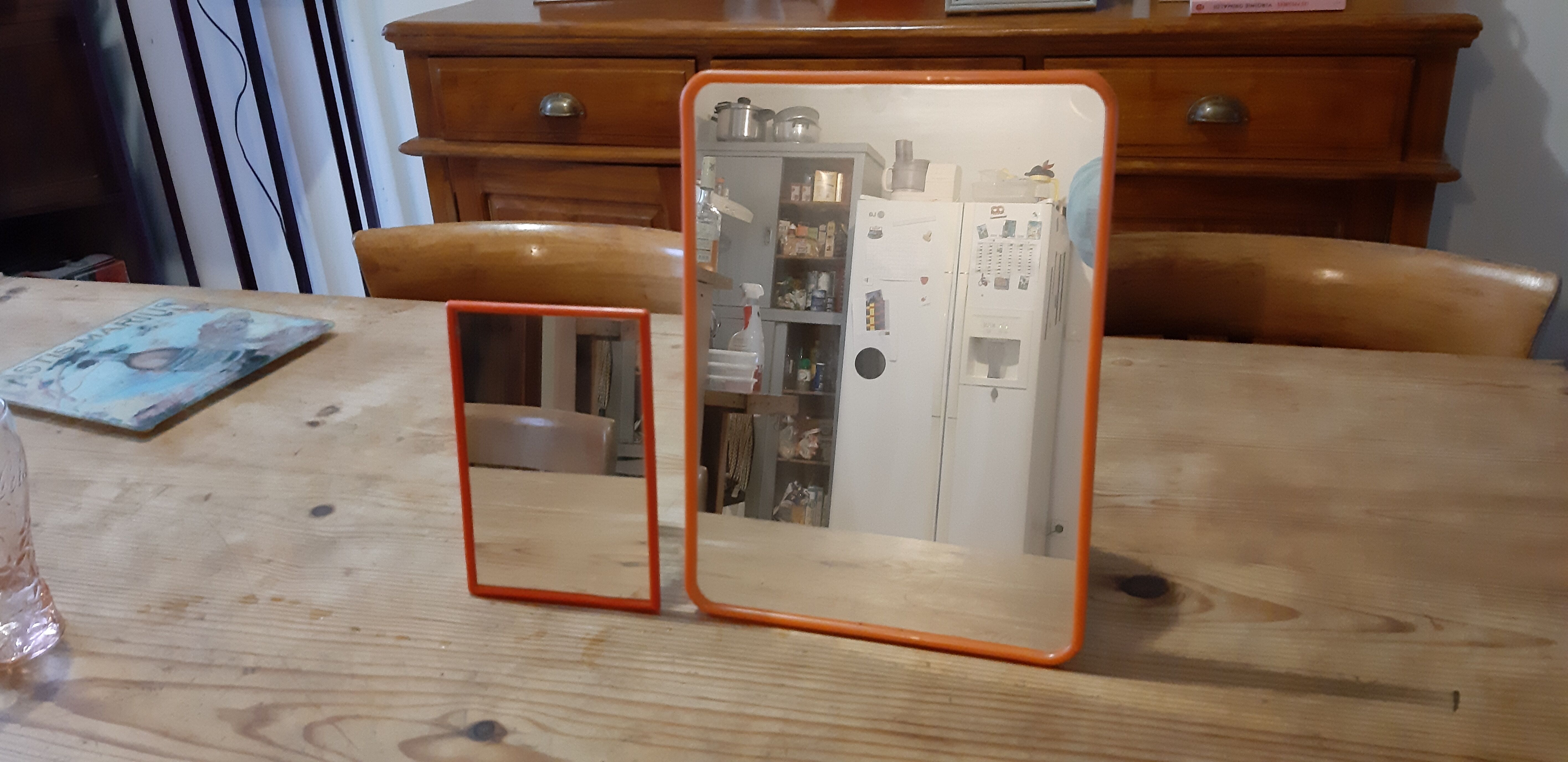 2 vintage plastic orange mirrors
