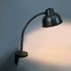 Old industrial articulated lamp with vice. Year 50
