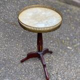 Tripod marble guéridon in gilded Louis XVI style.