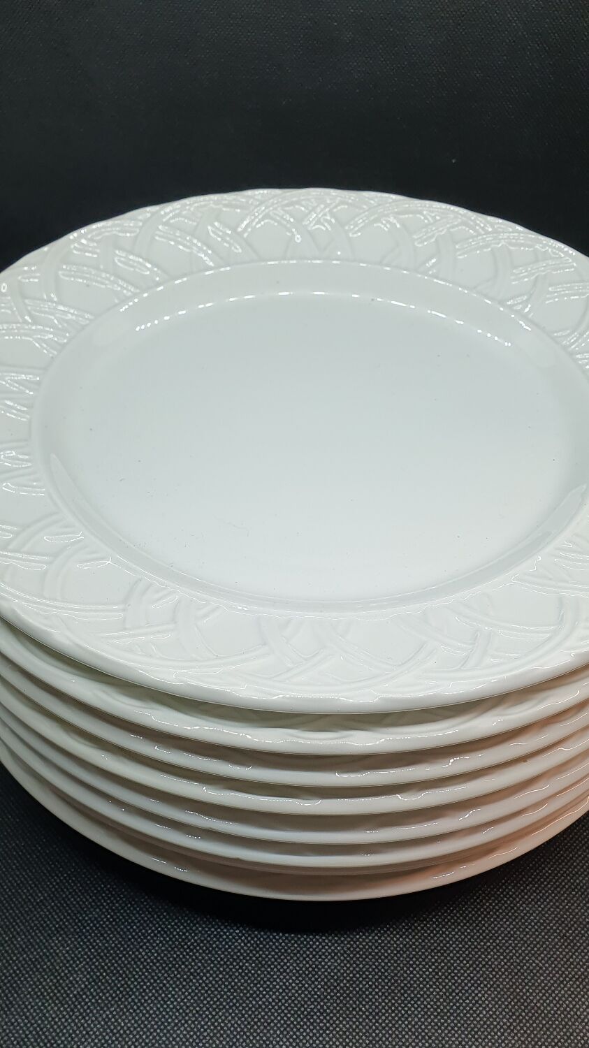 8 white ceramic plates