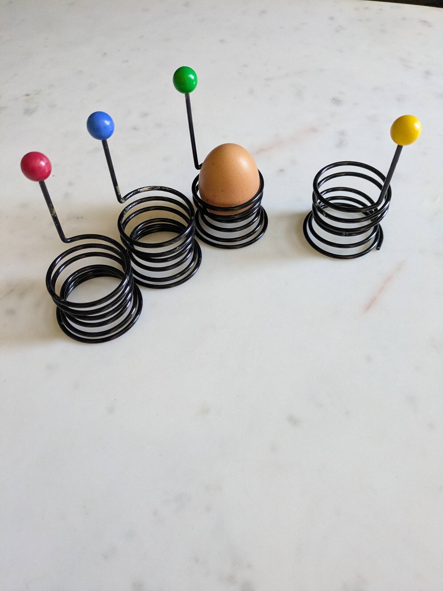 Set of egg cups "Egg Boy" by Wang and Merlo. Memphis design 80s.