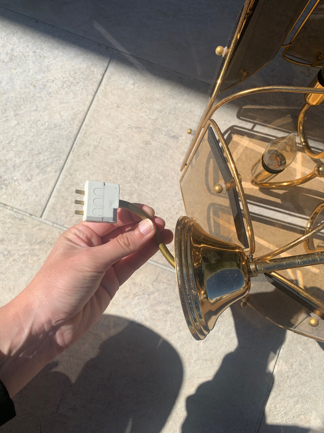 Brass and tinted glass pendant light