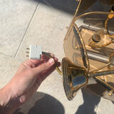 Brass and tinted glass pendant light