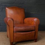 French leather club chair, chapeau de gendarme model circa 1930's in caramel