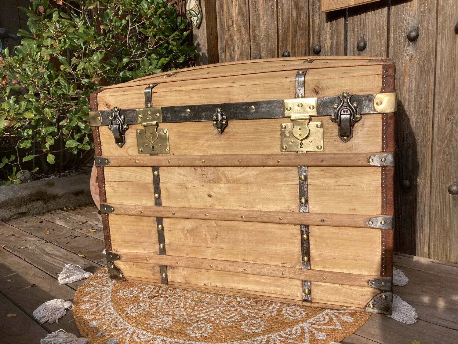 Exceptional curved leather/brass box with beautiful restored clasps.