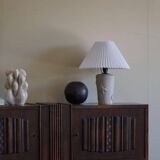 Modern vintage French table lamp, made of stone with fish patterns, 1970s.