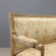 Antique neoclassical canapé in carved wood from the 19th century.