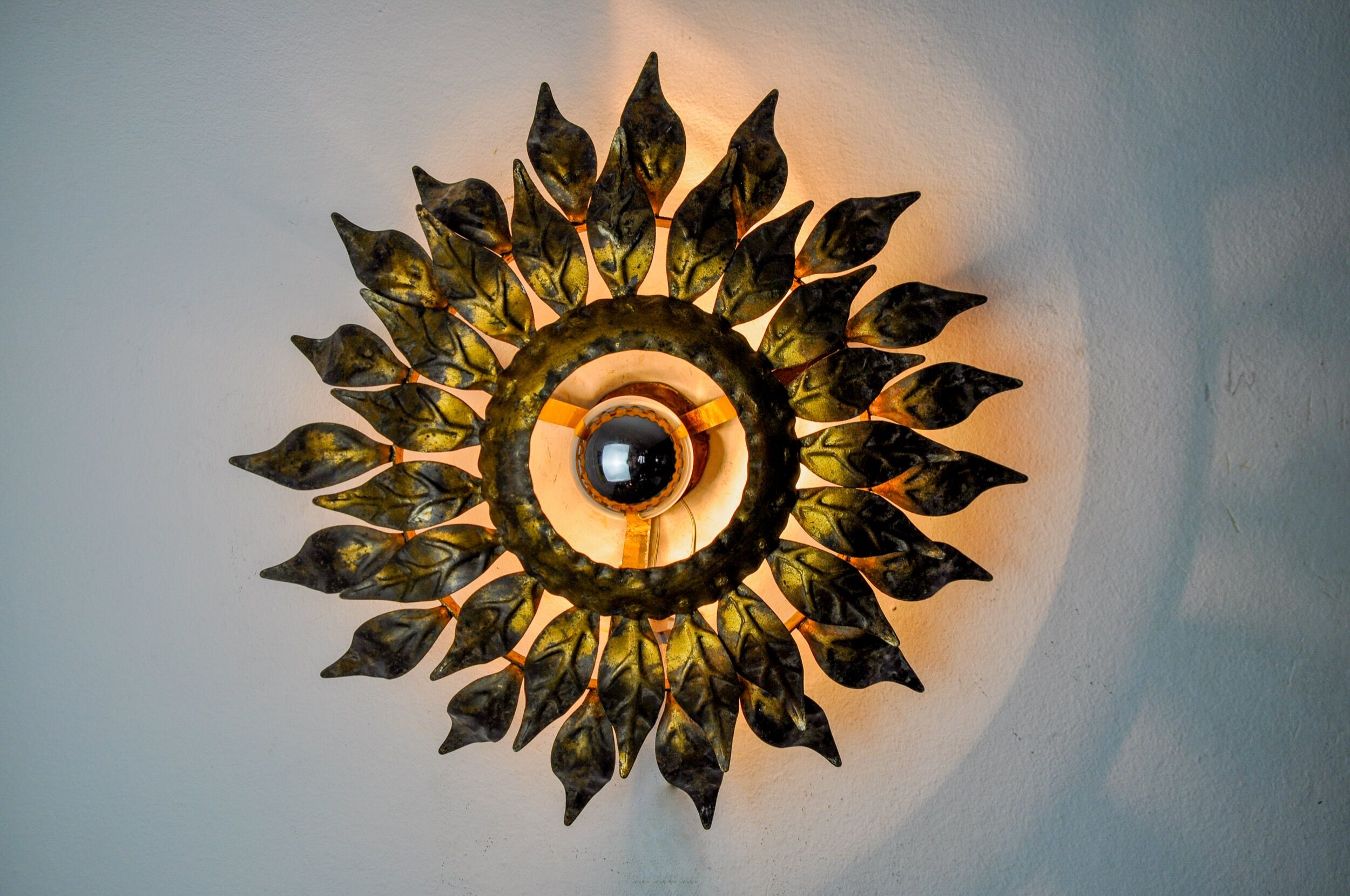 Sun wall lamp by ferro arte, metal and gold leaf, Spain, 1960