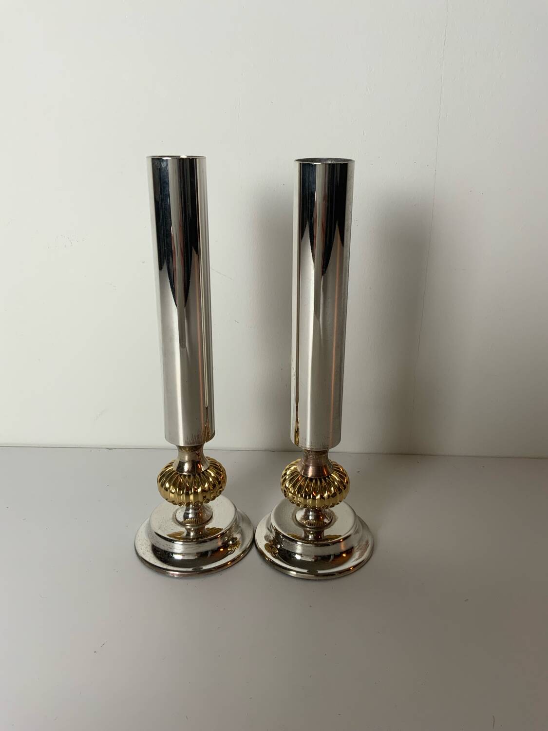 Pair of metal candlesticks