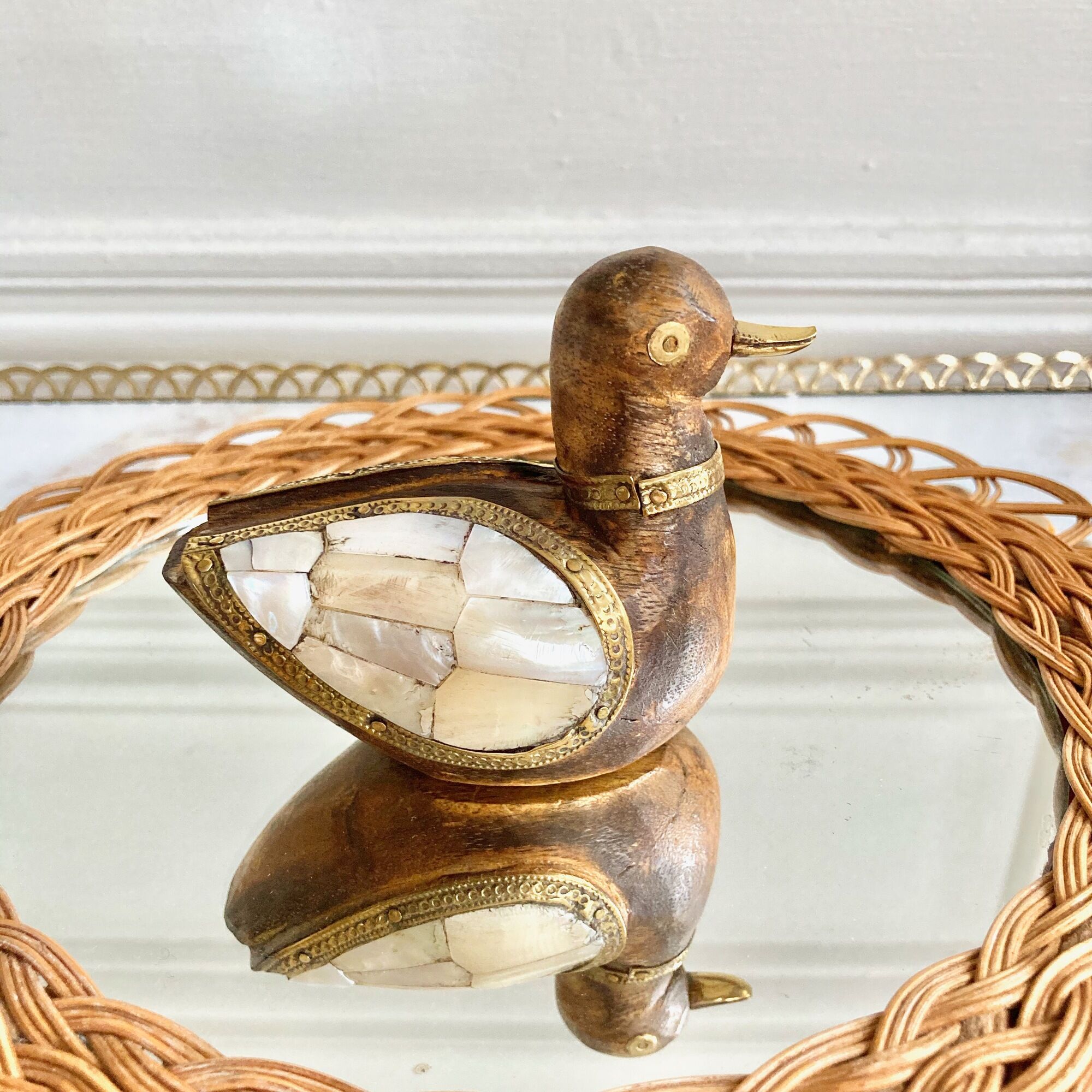 Wood brass duck and mother-of-pearl