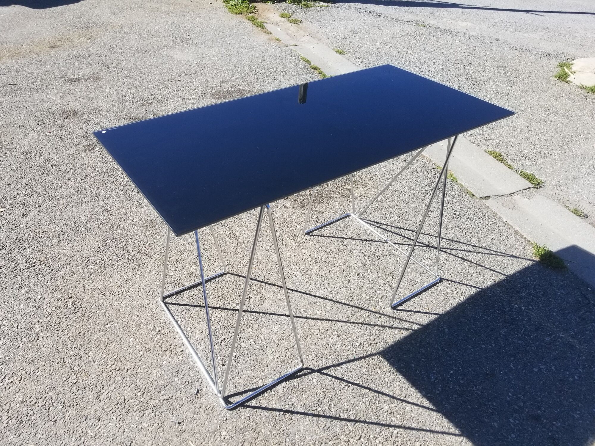 Vintage steel wire desk with chrome trestles and smoked glass top