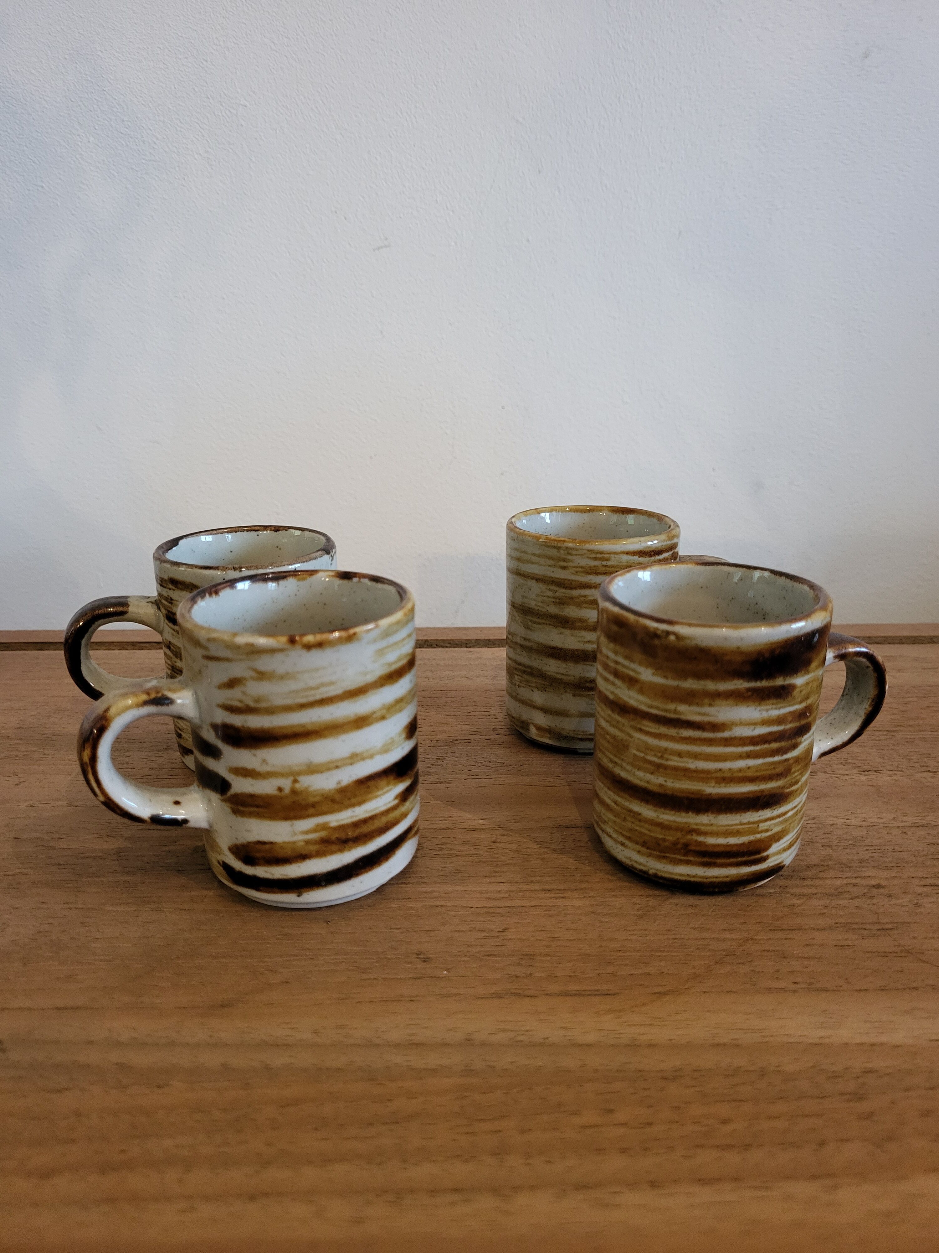 Hand-painted sandstone cups