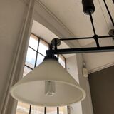 Lustre en fer à deux bras avec des abat-jour en verre opalin. Modèle Athena de Flamant