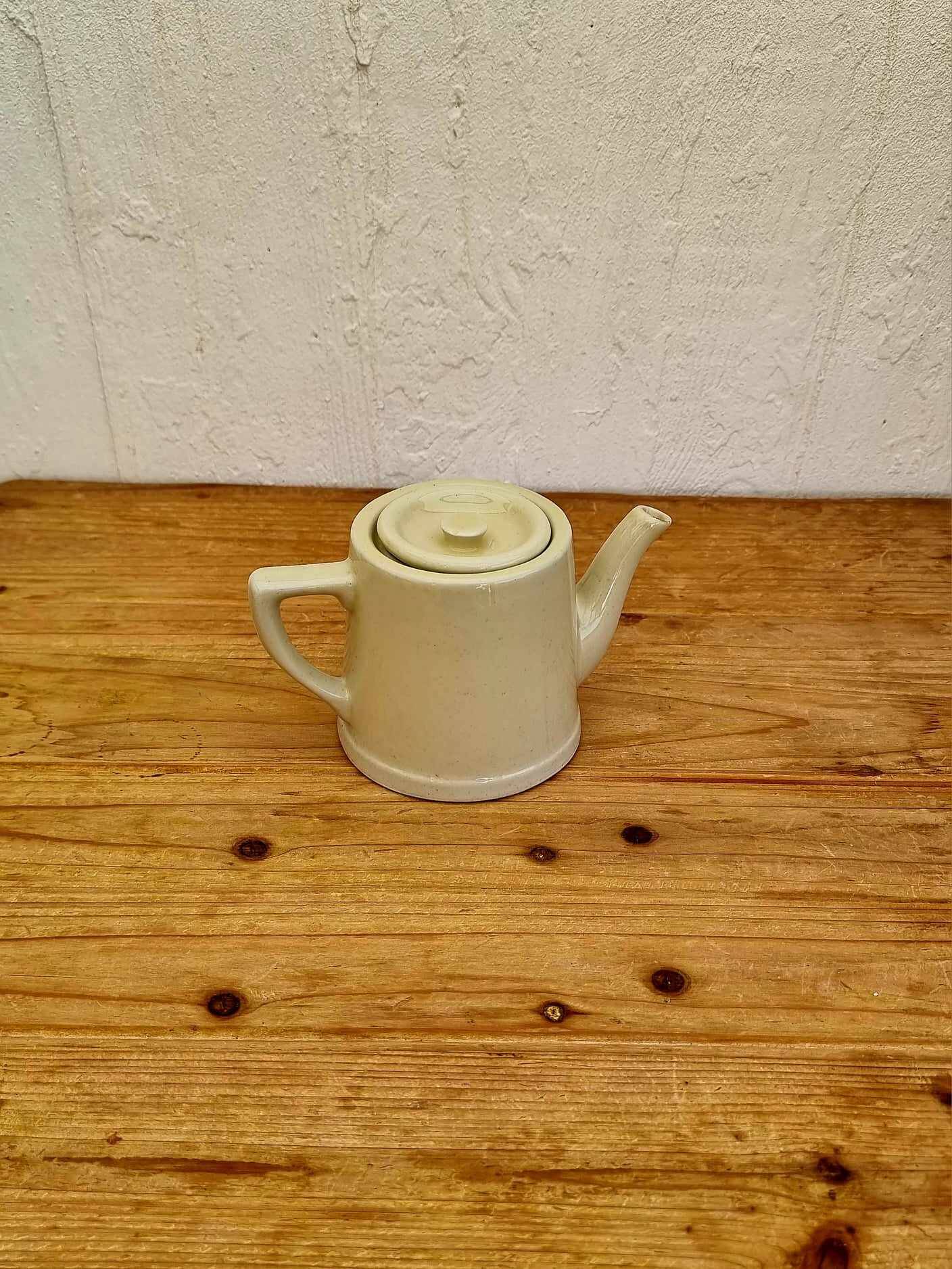 Vintage pastel yellow teapot