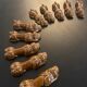 10 ceramic knife holders in the shape of a recumbent poodle