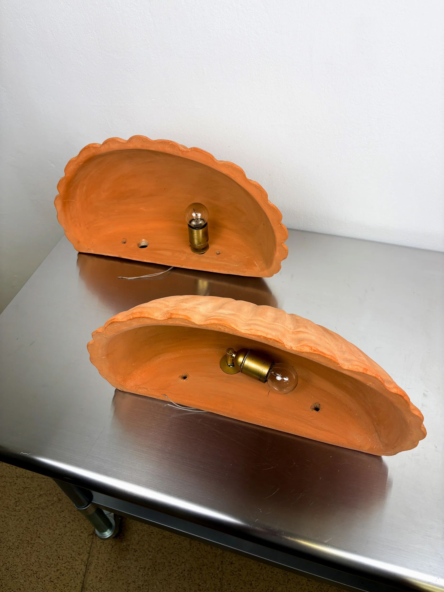 Pair of vintage Italian shell wall sconces, large terracotta sculptures, 1980s