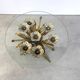 Charming metal flower coffee table or side table with a clear glass top. Made in Italy, attributed to Hans Kögl.