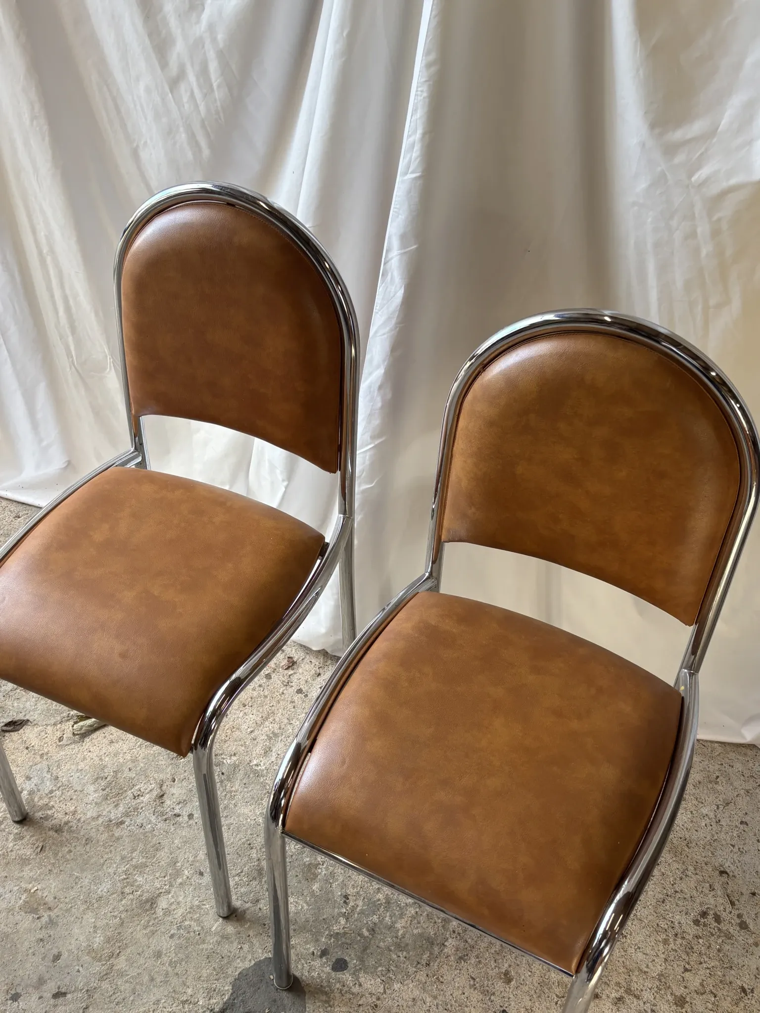 Set of 4 vintage tubular chrome chairs