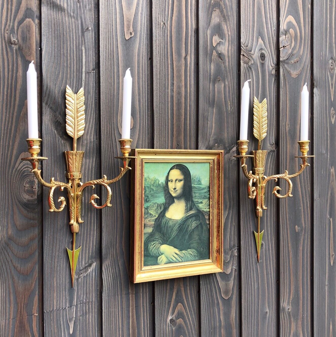 Pair of wall lamps decorated with bronze arrows "Cupid"