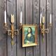 Pair of wall lamps decorated with bronze arrows "Cupid"
