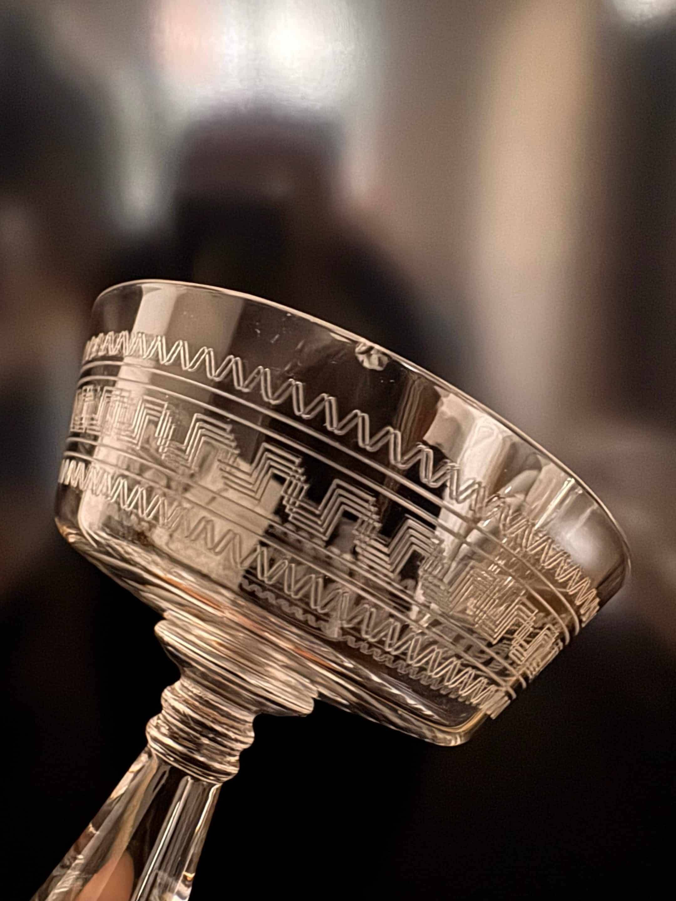 Baccarat, set of 10 engraved crystal champagne glasses from 1900.