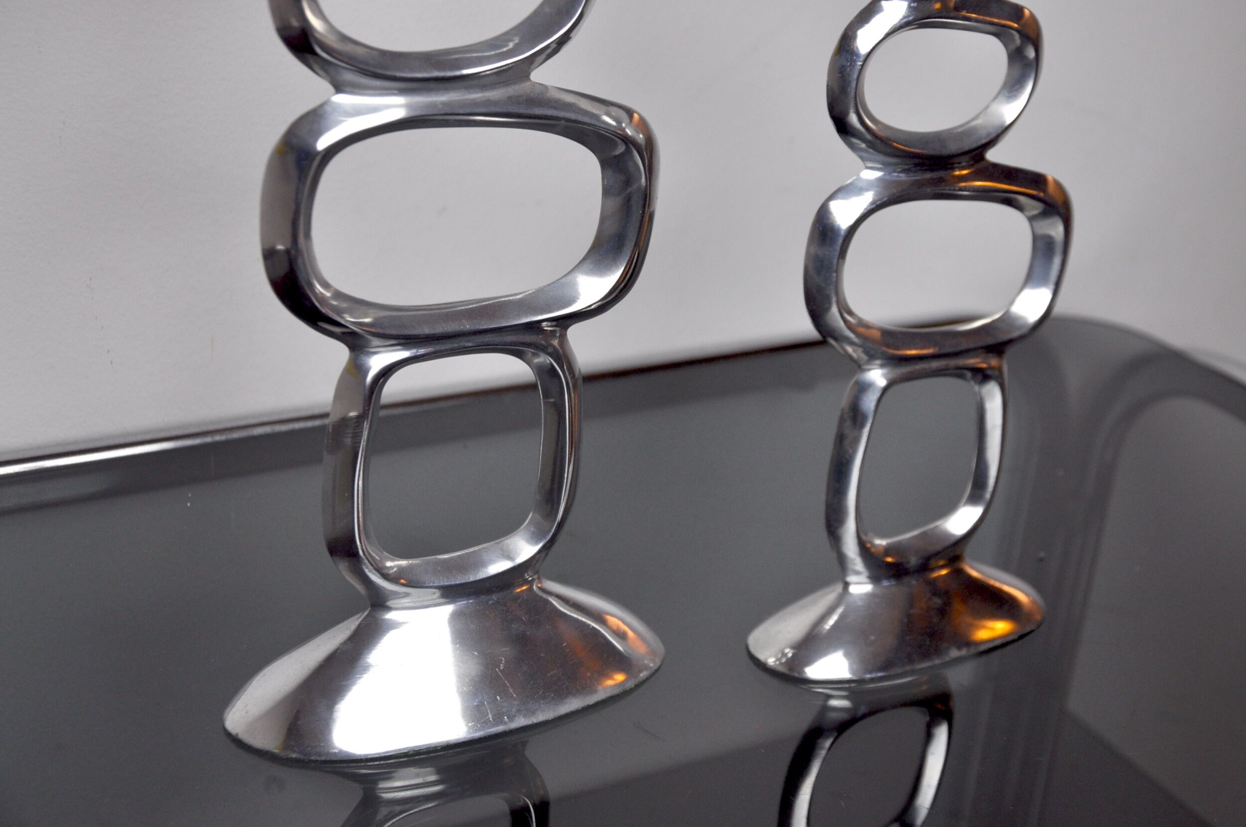 Pair of circle candlesticks by Matthew Hilton, England, 1980