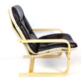 Scandinavian upholstered leather armchair