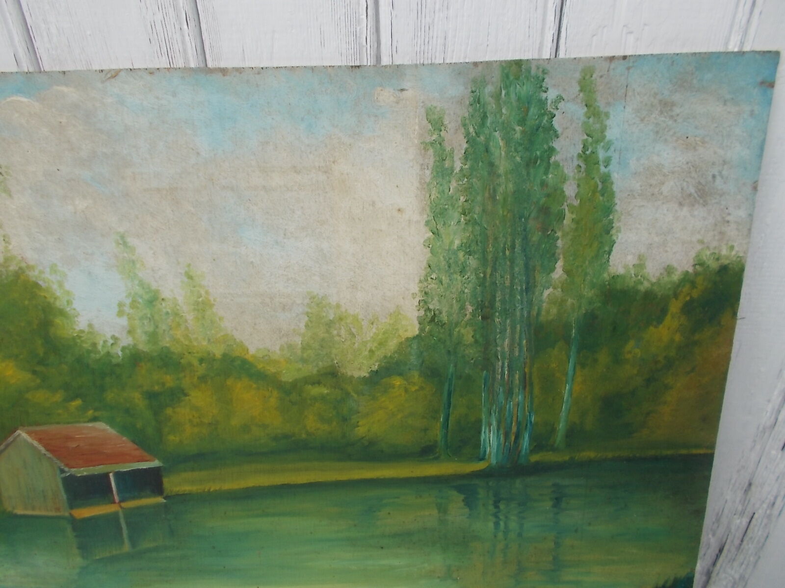 Tableau of a bouquet of flowers on a double-sided wooden panel.