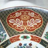 Chinese dish decorated with peacocks and plants