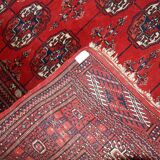 Tapis vintage fait main Tekke en laine rouge (109cm x 112cm) – Années 1970