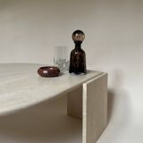 Travertine eye-shaped coffee table
