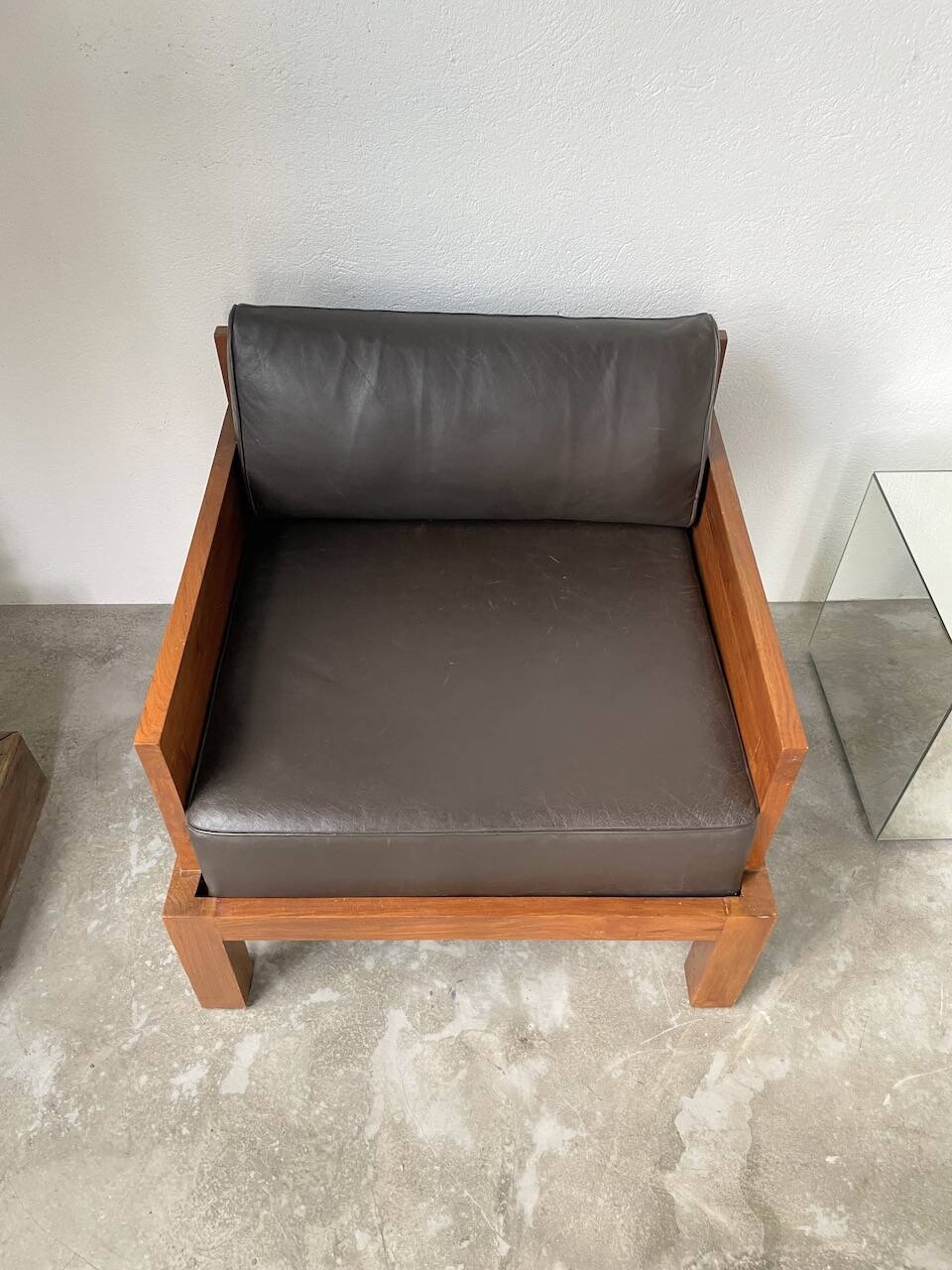 Modernist armchair in exotic wood and leather