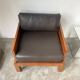 Modernist armchair in exotic wood and leather